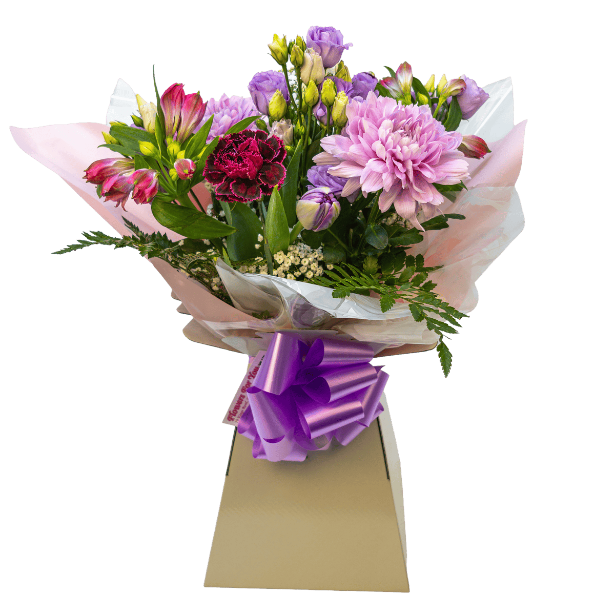 Purple and pink flower arrangement in a presentation box with a bow for local delivery.